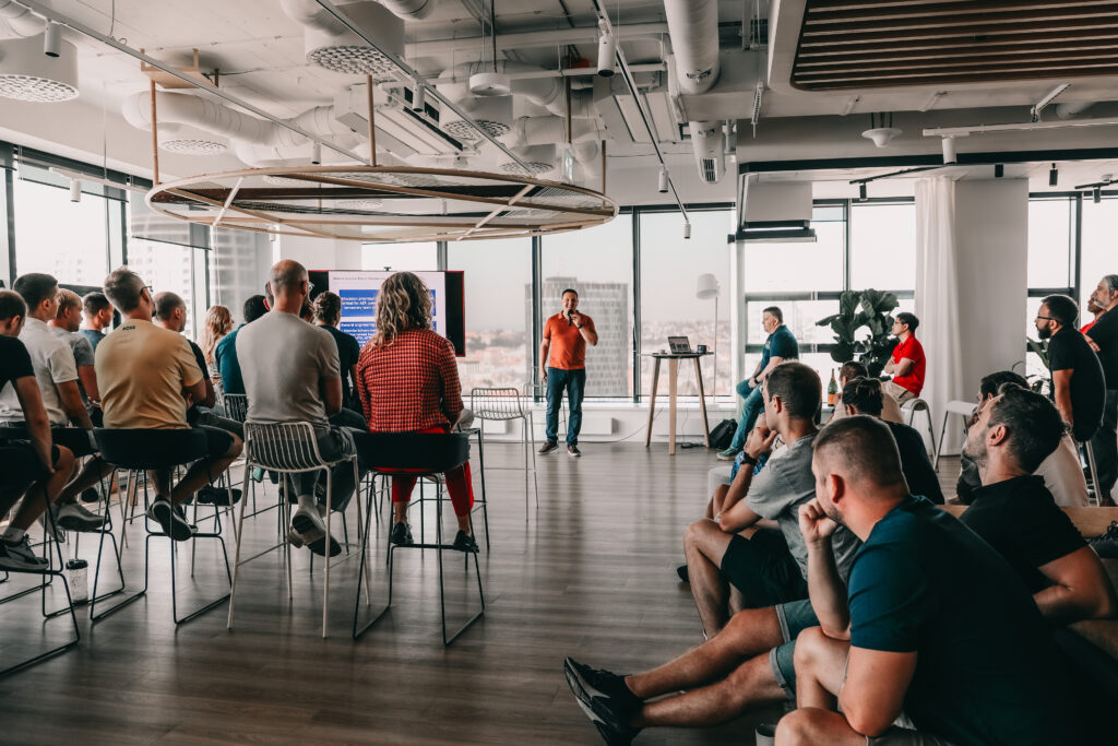 male director leading a company meeting