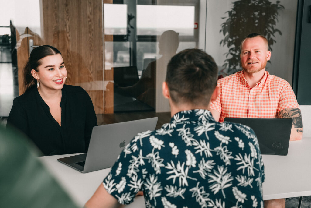 male and female recruiters having an interview with a candidate